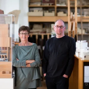 Architects Sheila O'Donnell and John Tuomey of O'Donnell + Tuomey, photographed together in their studio