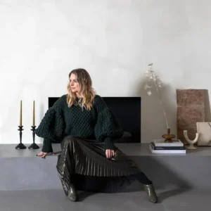 Susan McGowan, founder of Ashen & Cloud interior design studio, photographed in a minimalist interior setting